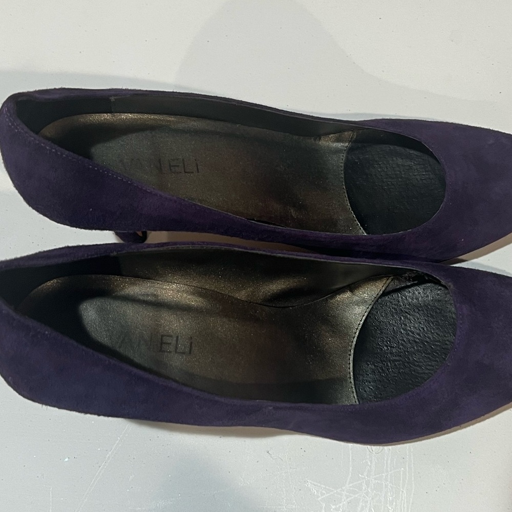 Purple suede pumps